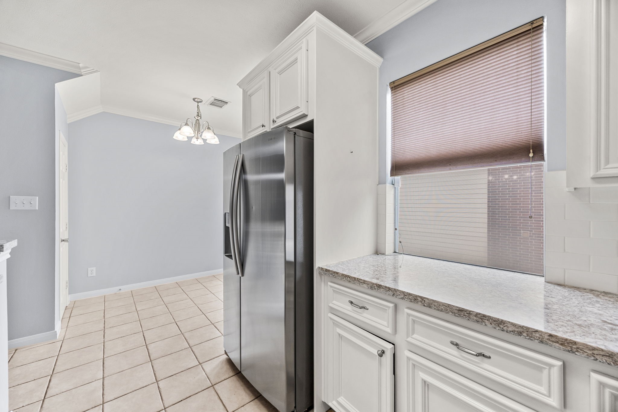 3023 Austin Street Houston, TX 77004 - Photo 14 of 26 Space for eating area off kitchen. Door on left is pantry.