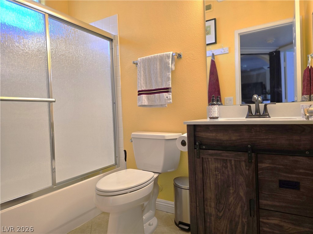 2050 West Warm Springs Road, Unit 2422 Henderson, NV 89014 - Photo 27 of 44 This bright bathroom features a vanity with ample storage and a contemporary shower.