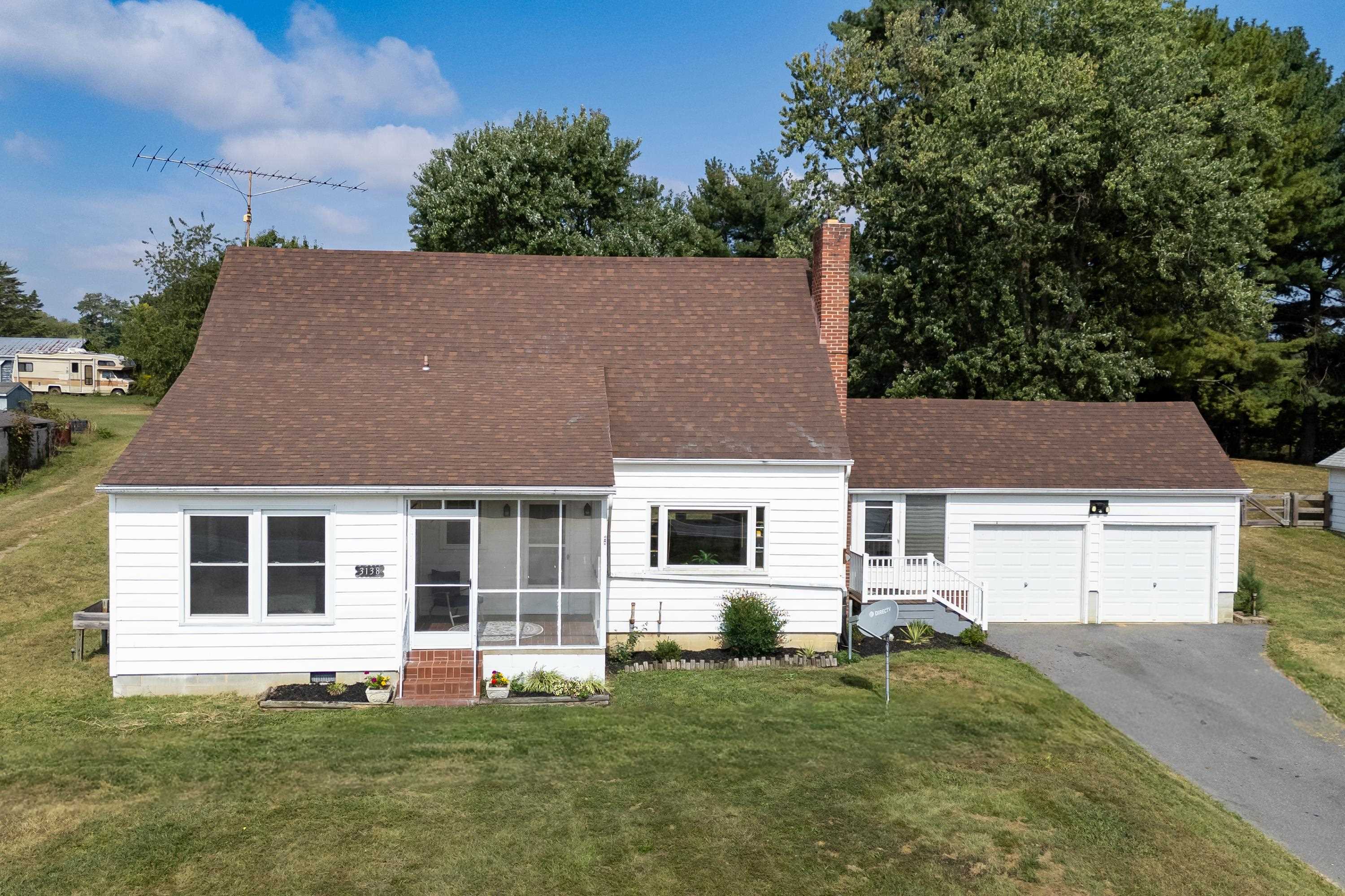3138 Cross Keys Road Harrisonburg, VA 22801 - Photo 1 of 74 The front view of the home located at 3138 Cross Keys Road. This home featutres a two car garage, large driveway for parking, screened porch, and front porch space. This home features a large lot and much more!