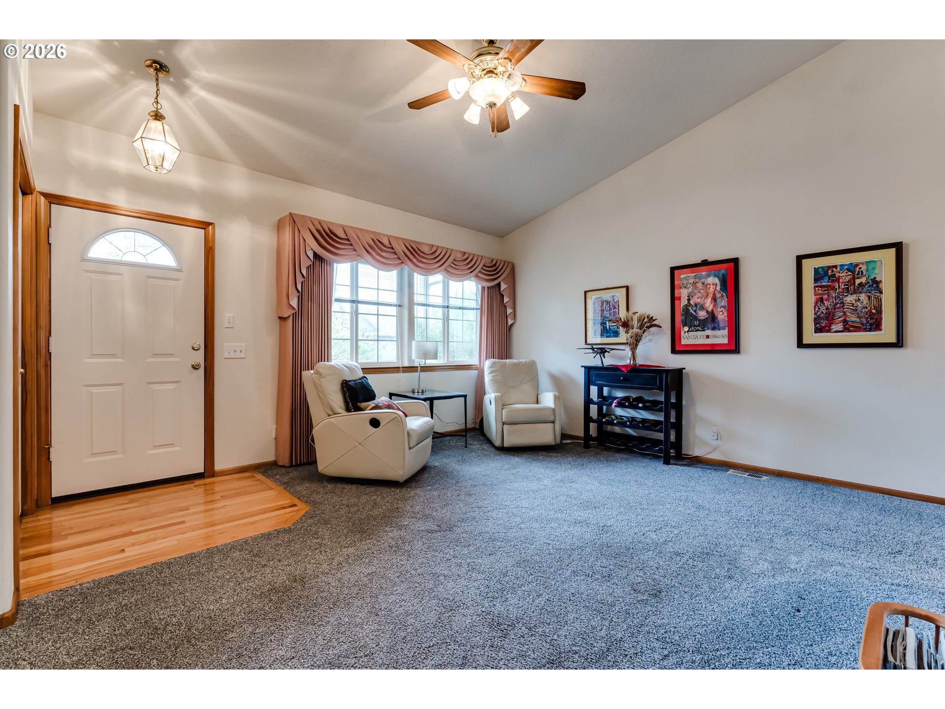 3513 Kendra Street Eugene, OR 97404 - Photo 10 of 45 a living room with furniture and a chandelier