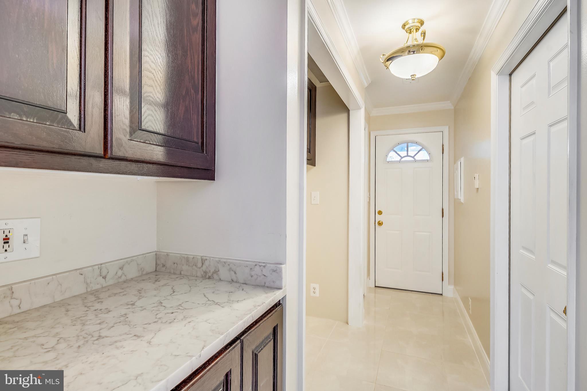 18824 Falling Star Road Germantown, MD 20874 - Photo 19 of 78 Side entrance mud room with heated flooring