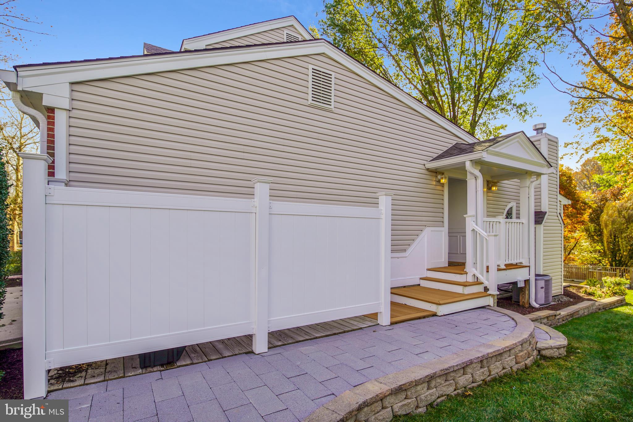 18824 Falling Star Road Germantown, MD 20874 - Photo 59 of 78 Hardscapes accents side entrance to home