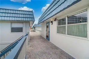 a view of a house with a large window