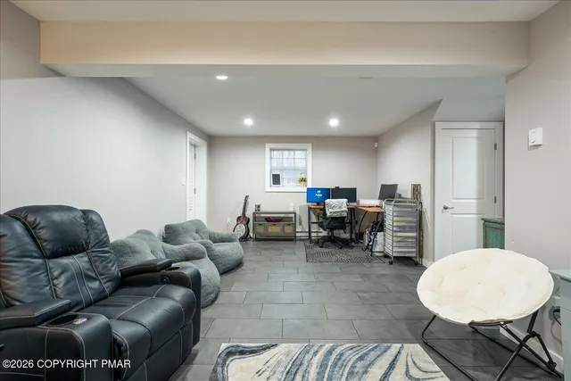 a view of a park with swings and slides