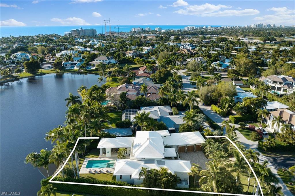 575 Palm Circle East Naples, FL 34102 - Photo 49 of 49 an aerial view of residential houses with outdoor space