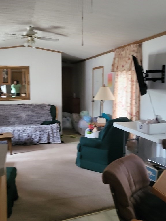 365 Main Street, Unit 2 Sturbridge, MA 01566 - Photo 12 of 24 a living room with furniture and a flat screen tv