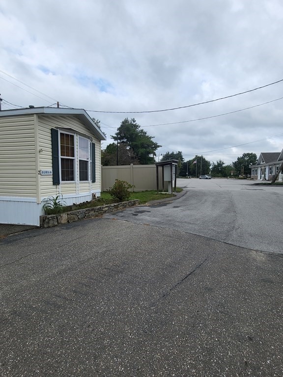 365 Main Street, Unit 2 Sturbridge, MA 01566 - Photo 9 of 24 a view of a house with backyard