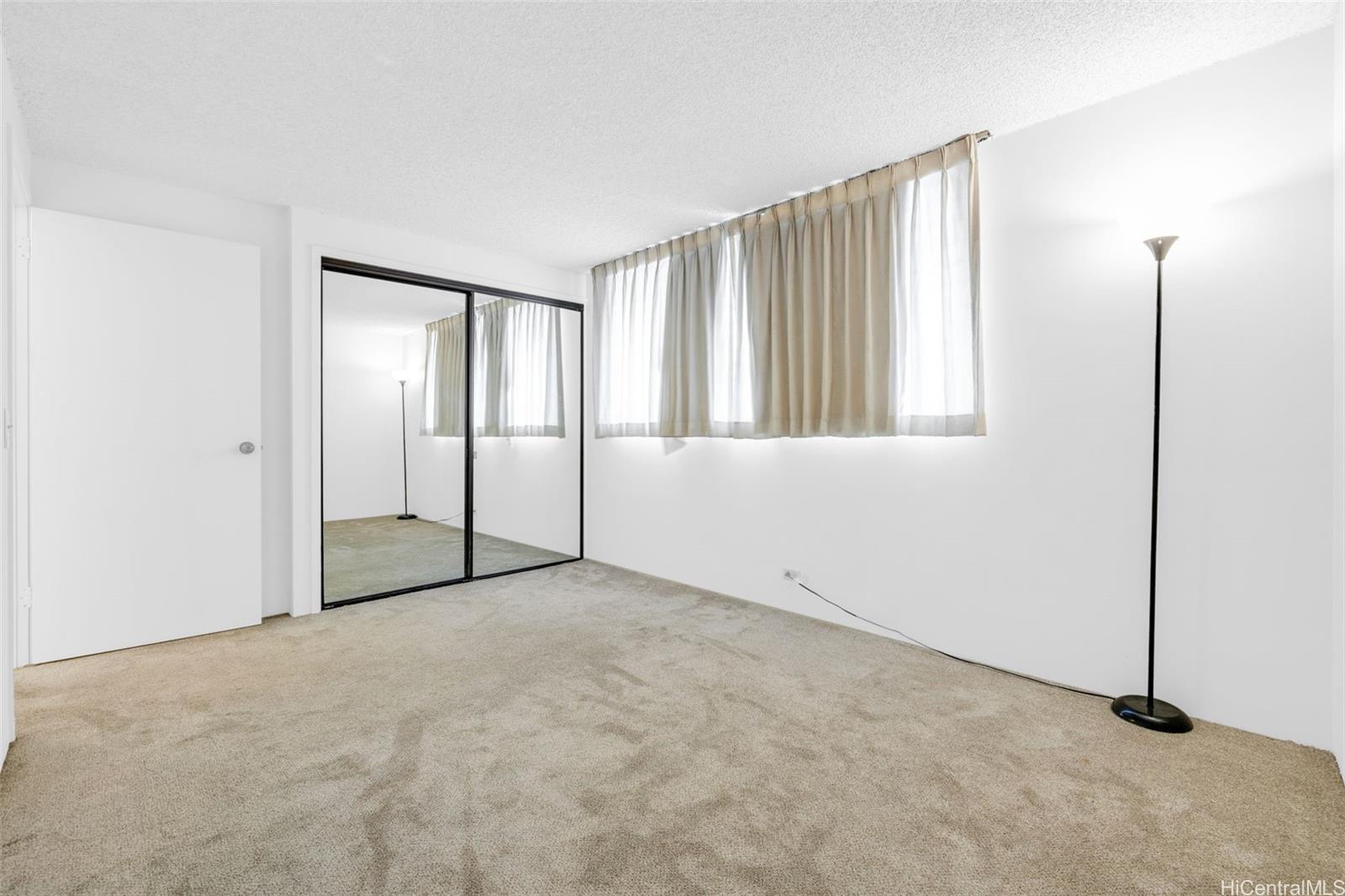 1820 Waiola Street Honolulu, HI 96826 - Photo 13 of 17 an empty room with windows