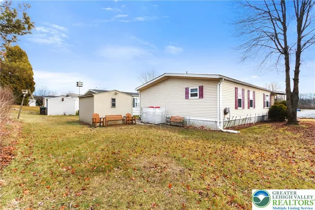 a view of a backyard with a garden