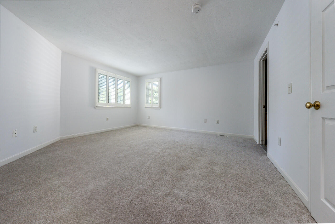 9 Executive Drive Mashpee, MA 02649 - Photo 11 of 15 an empty room with windows