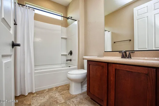 a view of storage and utility room with washer and dryer