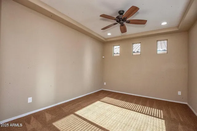 a view of a refrigerator in kitchen and wooden floor