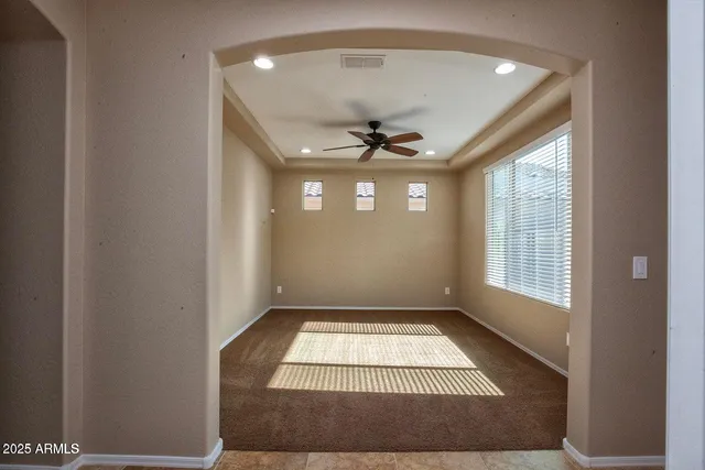 a view of entryway with a chandelier
