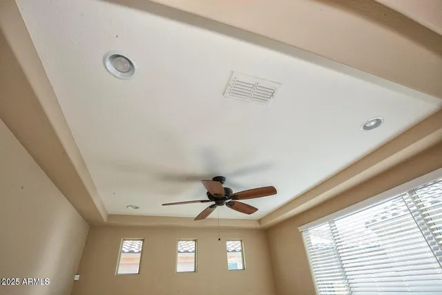 a view of an empty room with a sliding door