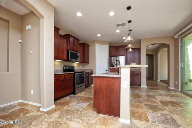 a view of a big room with windows