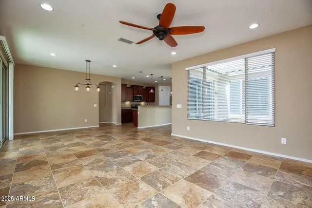 a view of a walk in closet and bedroom