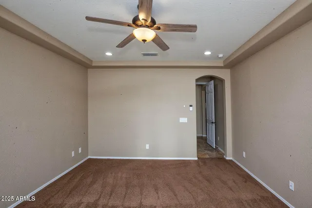 a view of a wooden door and a bench