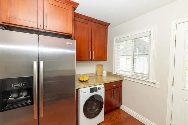 a utility room with dryer and washer
