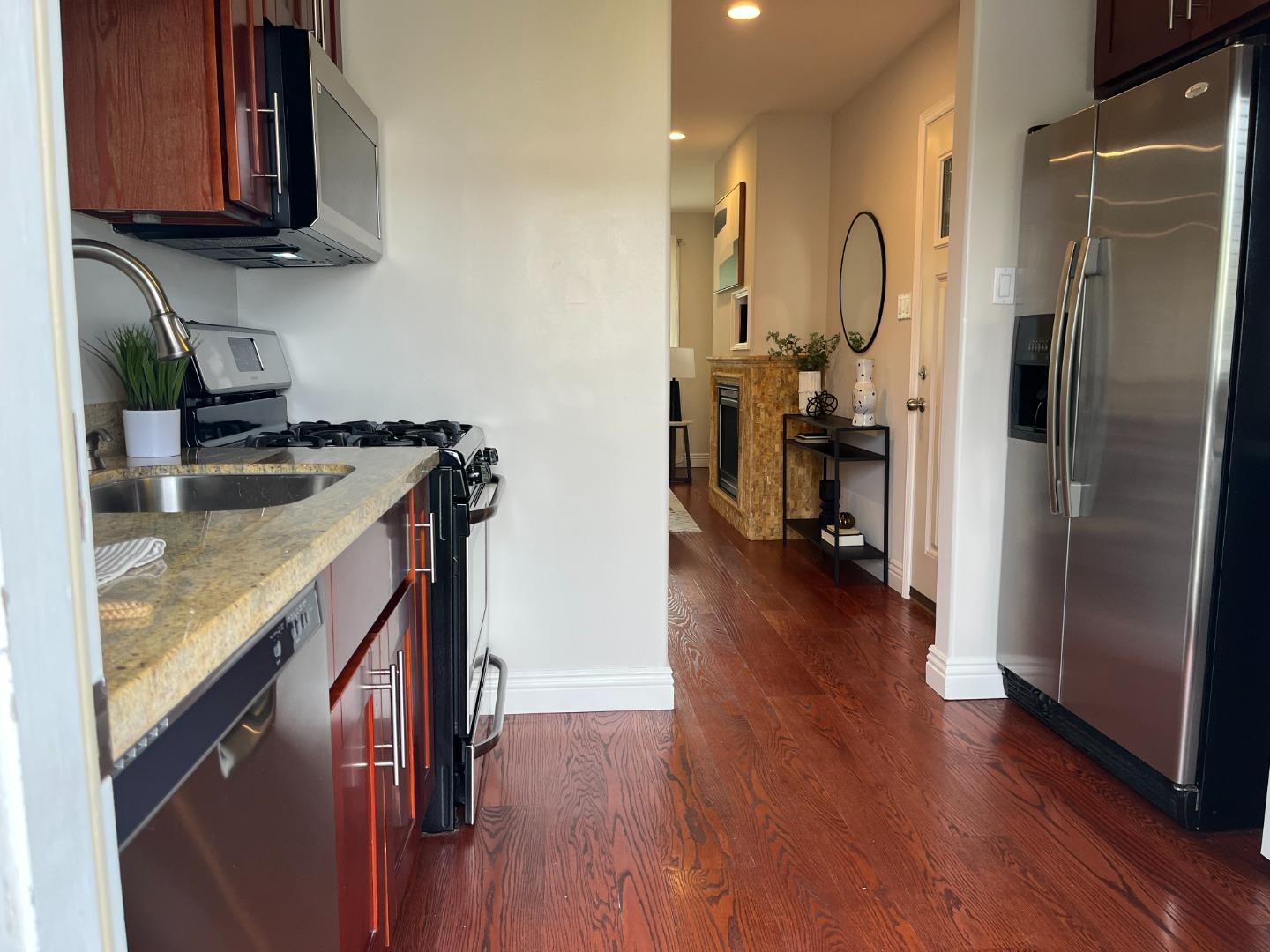 1609 Bonita Avenue, Unit 5 Berkeley, CA 94709 - Photo 12 of 17 a kitchen with a sink appliances and cabinets
