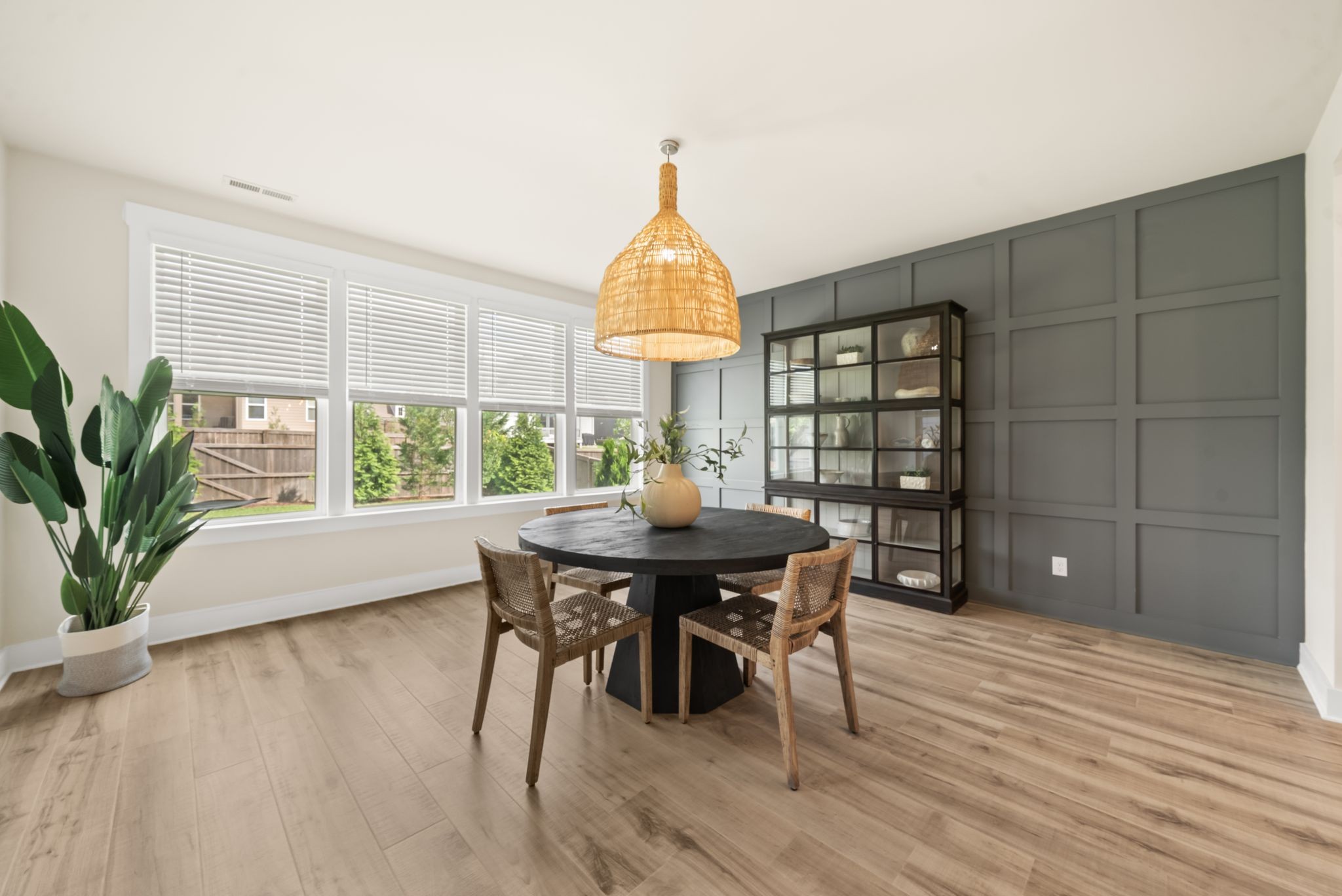 4043 John Marsh Road Spring Hill, TN 37174 - Photo 32 of 56 a view of a dining room with furniture window and wooden floor