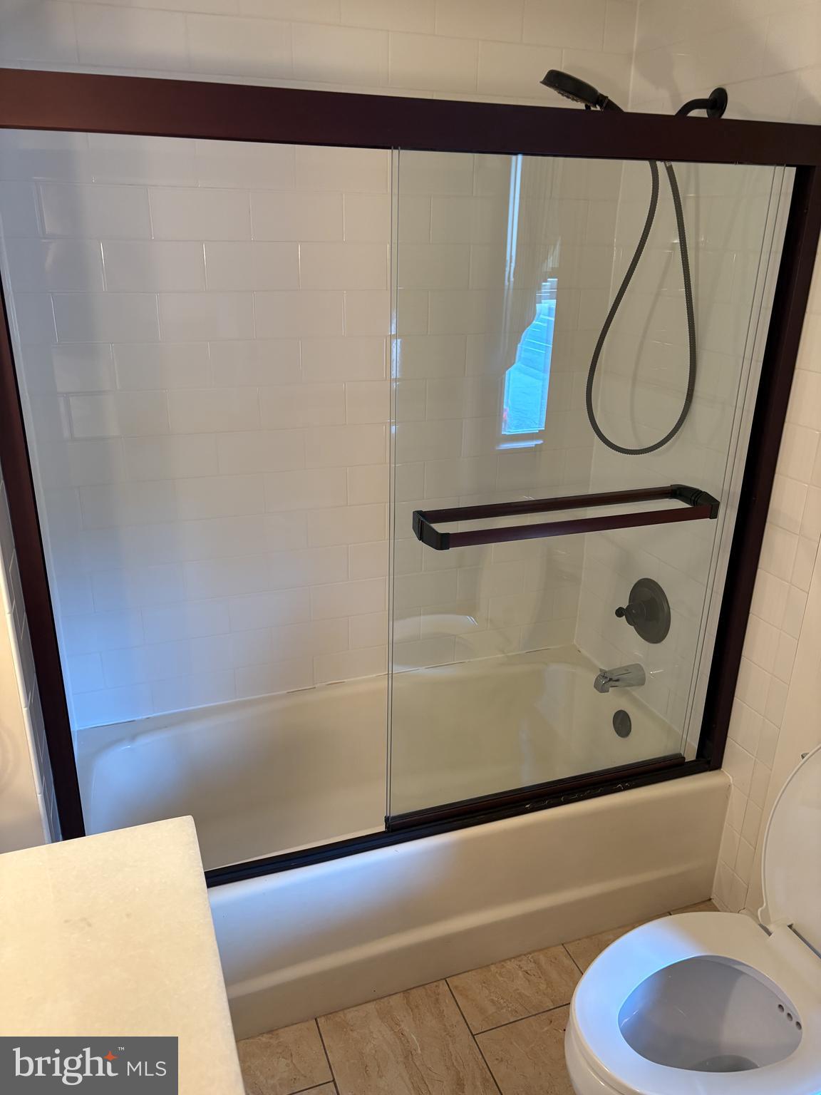 1906 Hanover Pike Hampstead, MD 21074 - Photo 19 of 45 a bathroom with a tub and a shower