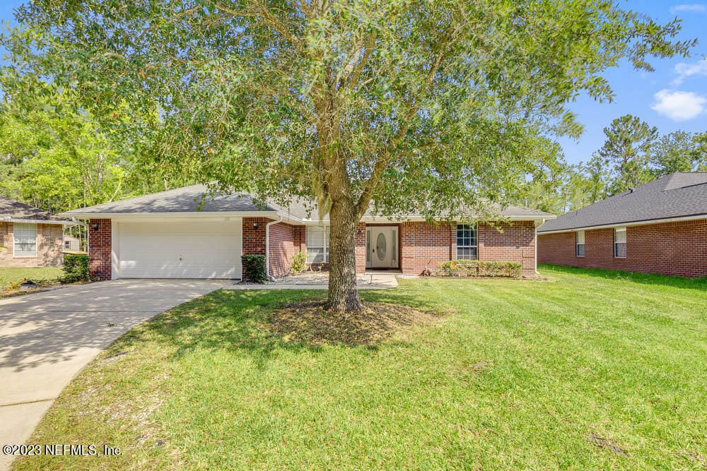 1399 Guardian Drive Jacksonville, FL 32221 - Photo 2 of 29 a house view with a garden space