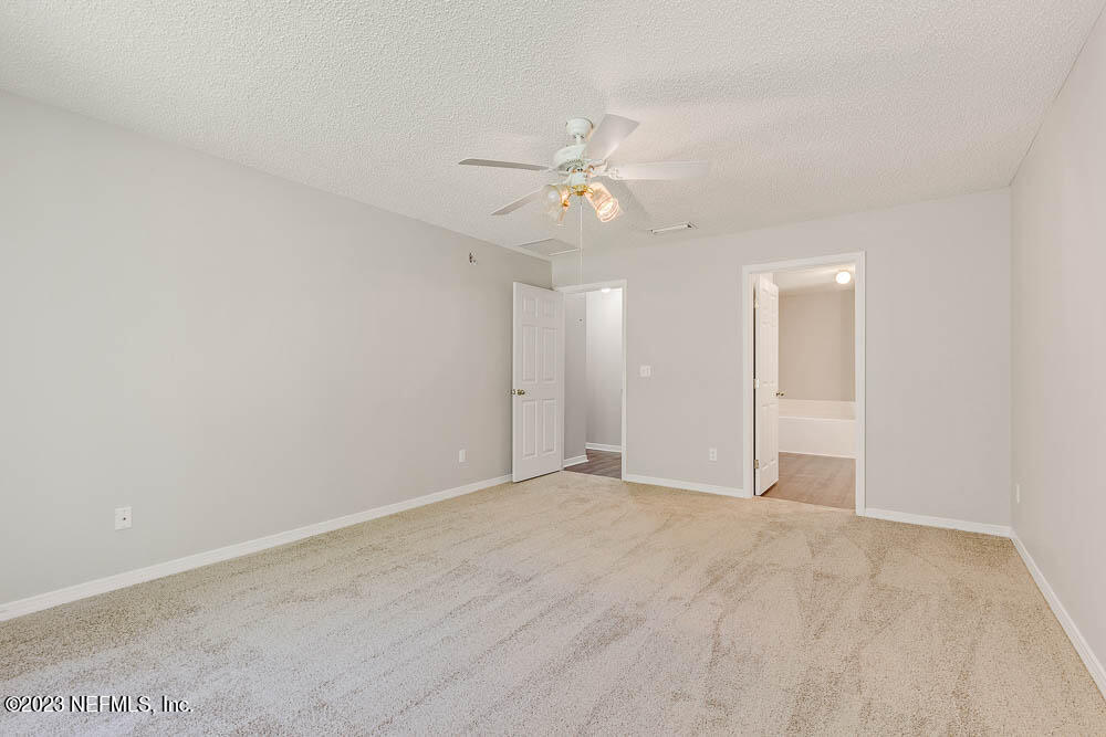 1399 Guardian Drive Jacksonville, FL 32221 - Photo 22 of 29 wooden floor in an empty room