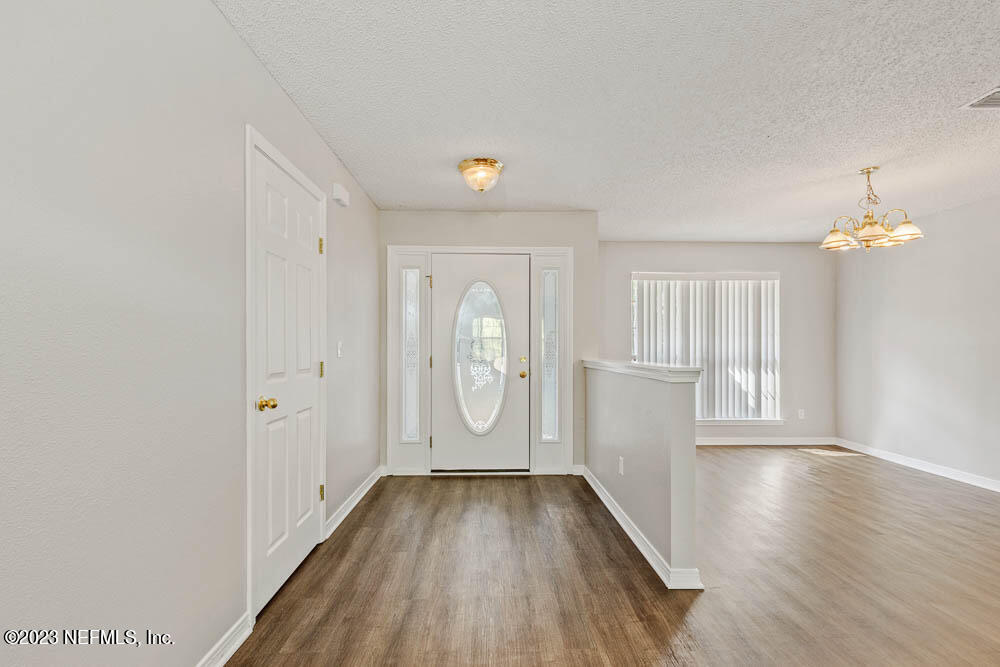 1399 Guardian Drive Jacksonville, FL 32221 - Photo 5 of 29 a view of an empty room with a window