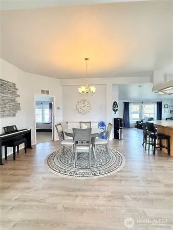 a view of a dining room with furniture