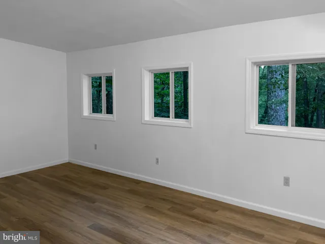 a view of a room that has a window in it