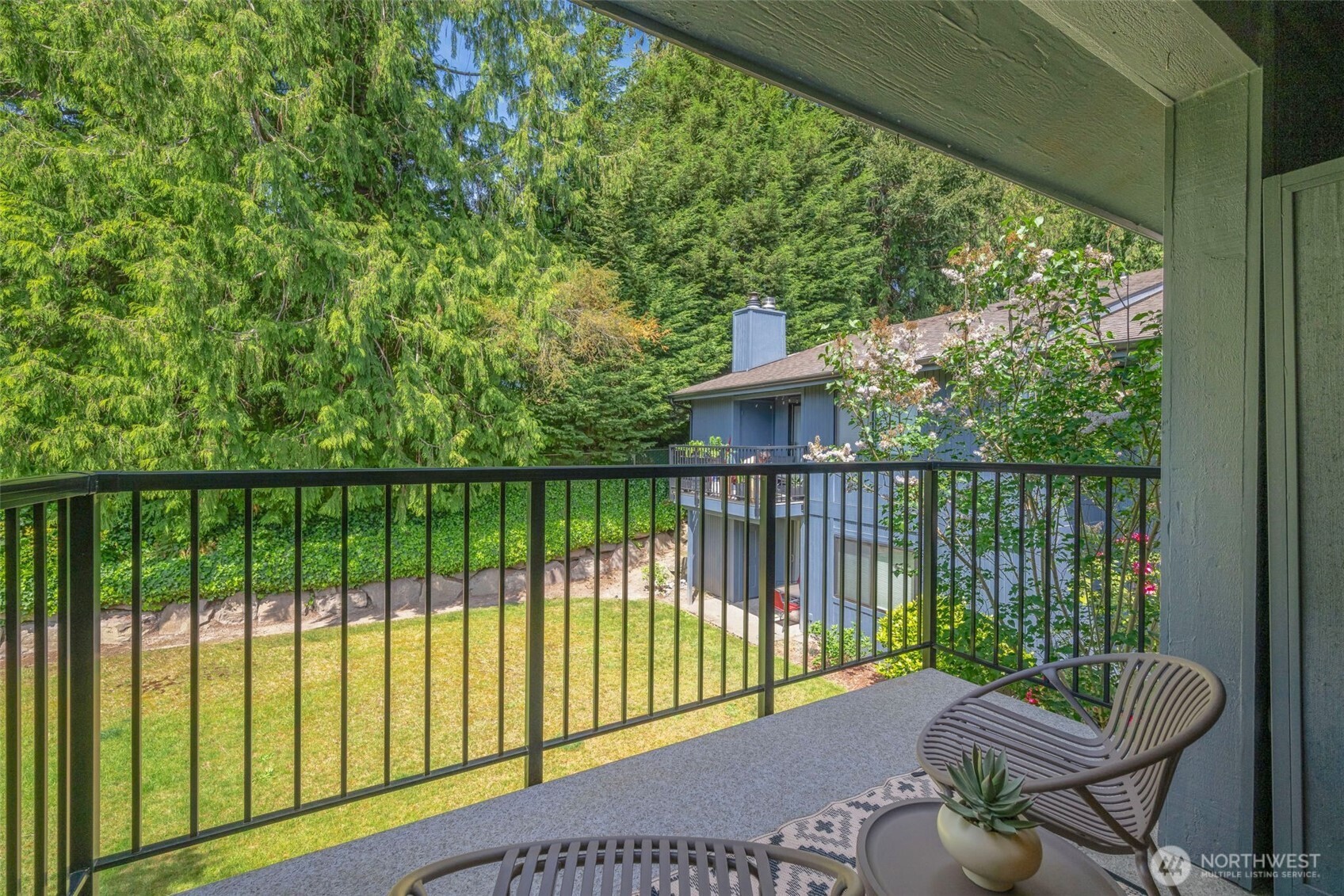 8017 196th Street Southwest, Unit 6B Edmonds, WA 98026 - Photo 5 of 23 a view of a balcony with wooden floor