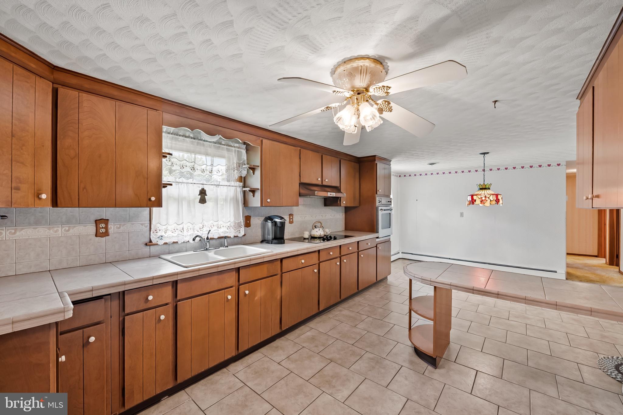 2100 Peterman Road Freeland, MD 21053 - Photo 15 of 36 Spacious kitchen with warm wood tones.