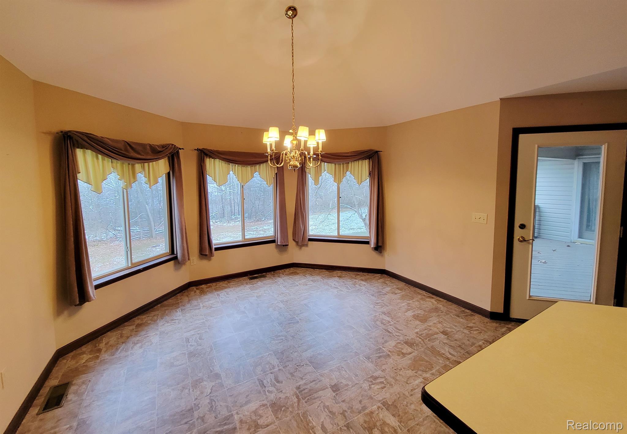 4608 Jasmond Road Goodrich, MI 48438 - Photo 26 of 60 Dining area has bay windows overlooking lawn area.