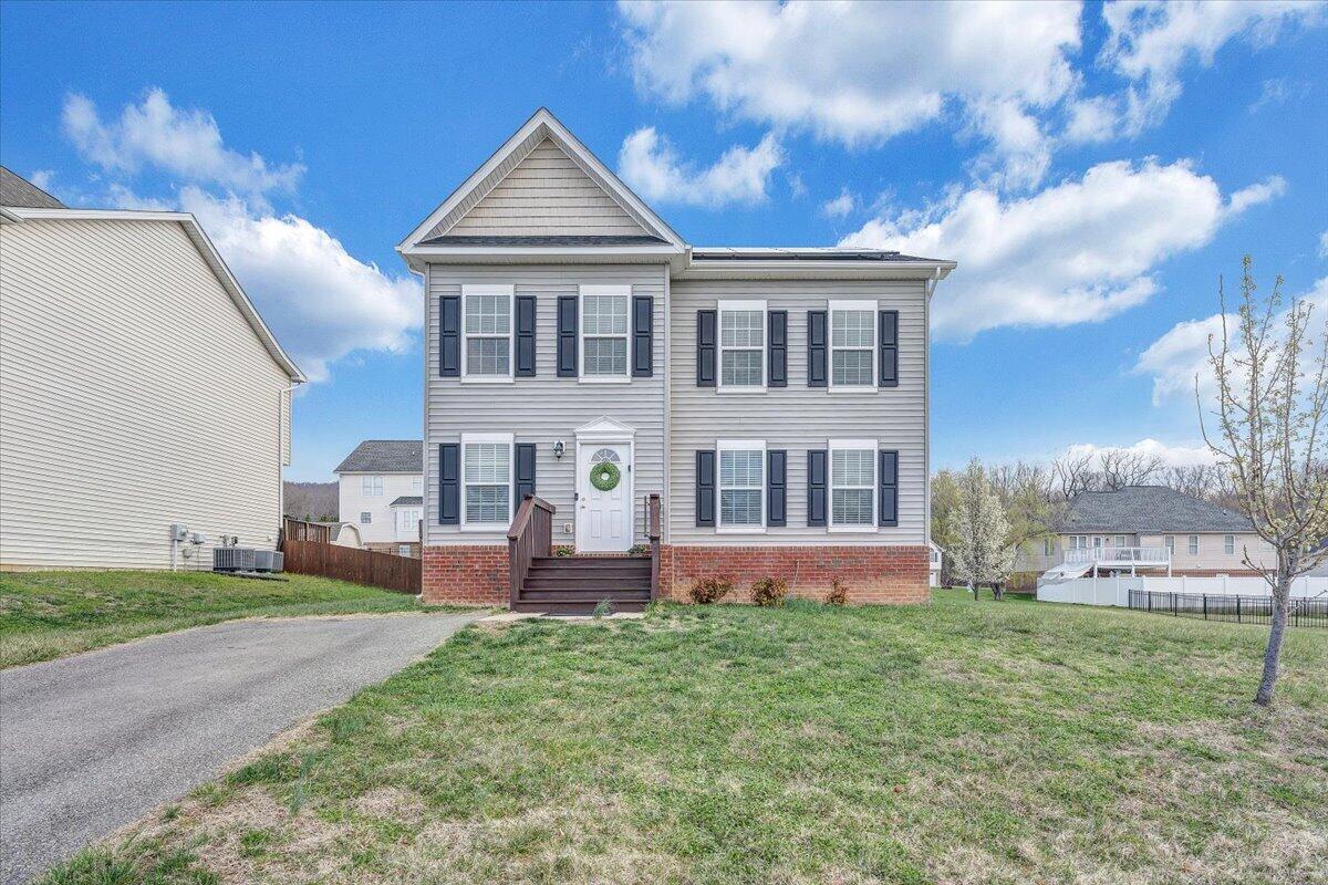 427 Cambridge Ct Road Vinton, VA 24179 - Photo 44 of 46 a front view of a house with garden