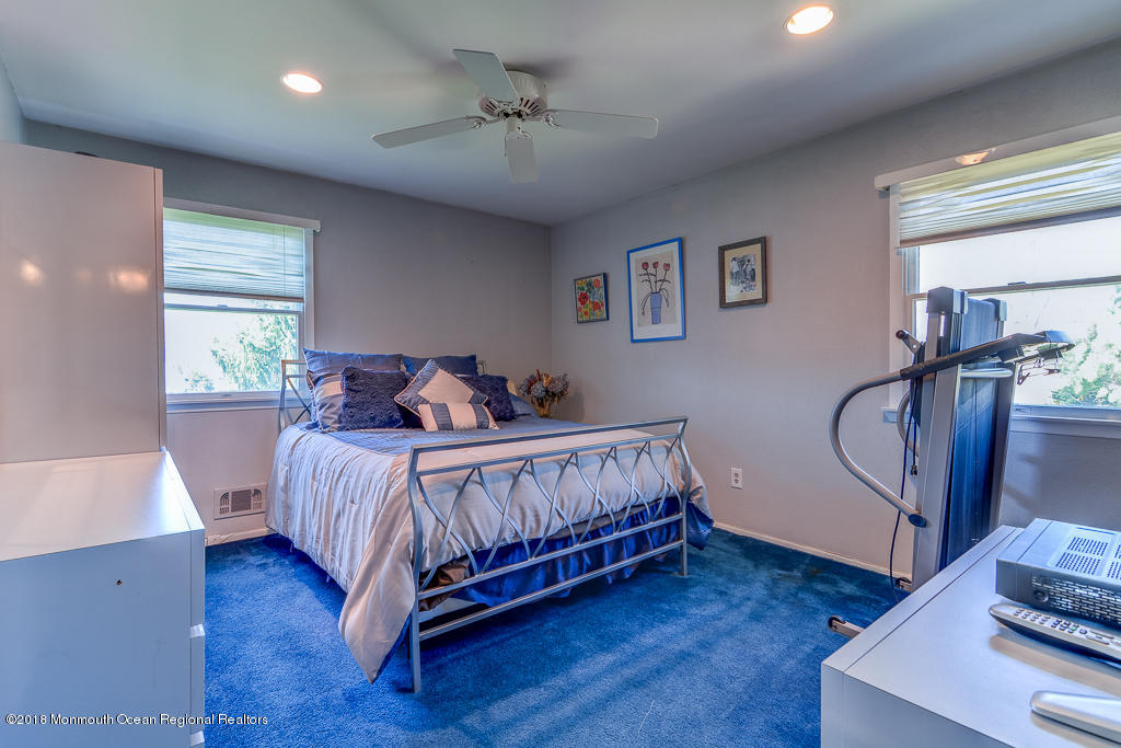 6 South Westfield Road Howell, NJ 07731 - Photo 17 of 21 a bed room with a bed and window