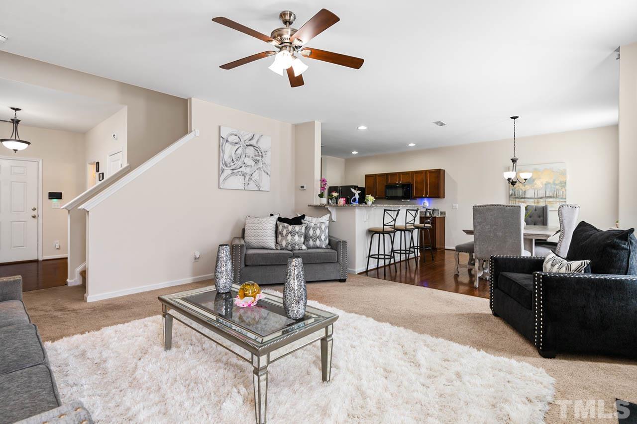 3540 Eastern Branch Road Raleigh, NC 27610 - Photo 15 of 35 a living room with furniture and kitchen view