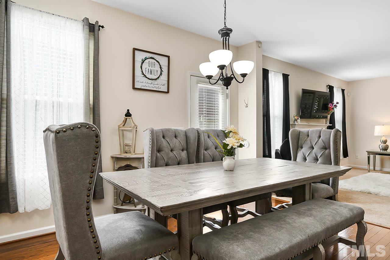 3540 Eastern Branch Road Raleigh, NC 27610 - Photo 18 of 35 a view of a dining room with furniture window and wooden floor