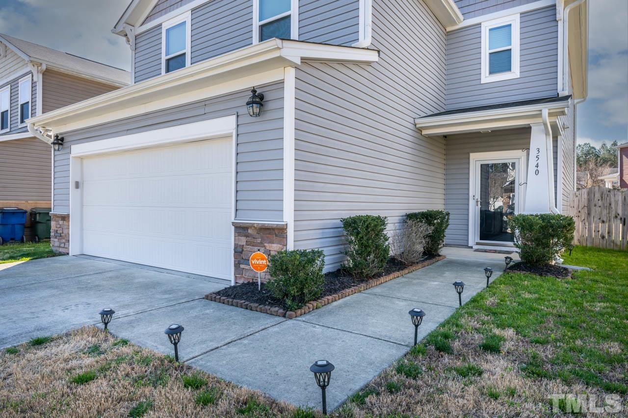 3540 Eastern Branch Road Raleigh, NC 27610 - Photo 4 of 35 a front view of a house with garden