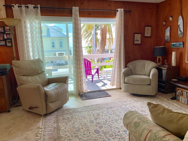 450 La Fitte Road Summerland Key, FL 33042 - Photo 20 of 31 Living room has impact sliding door
