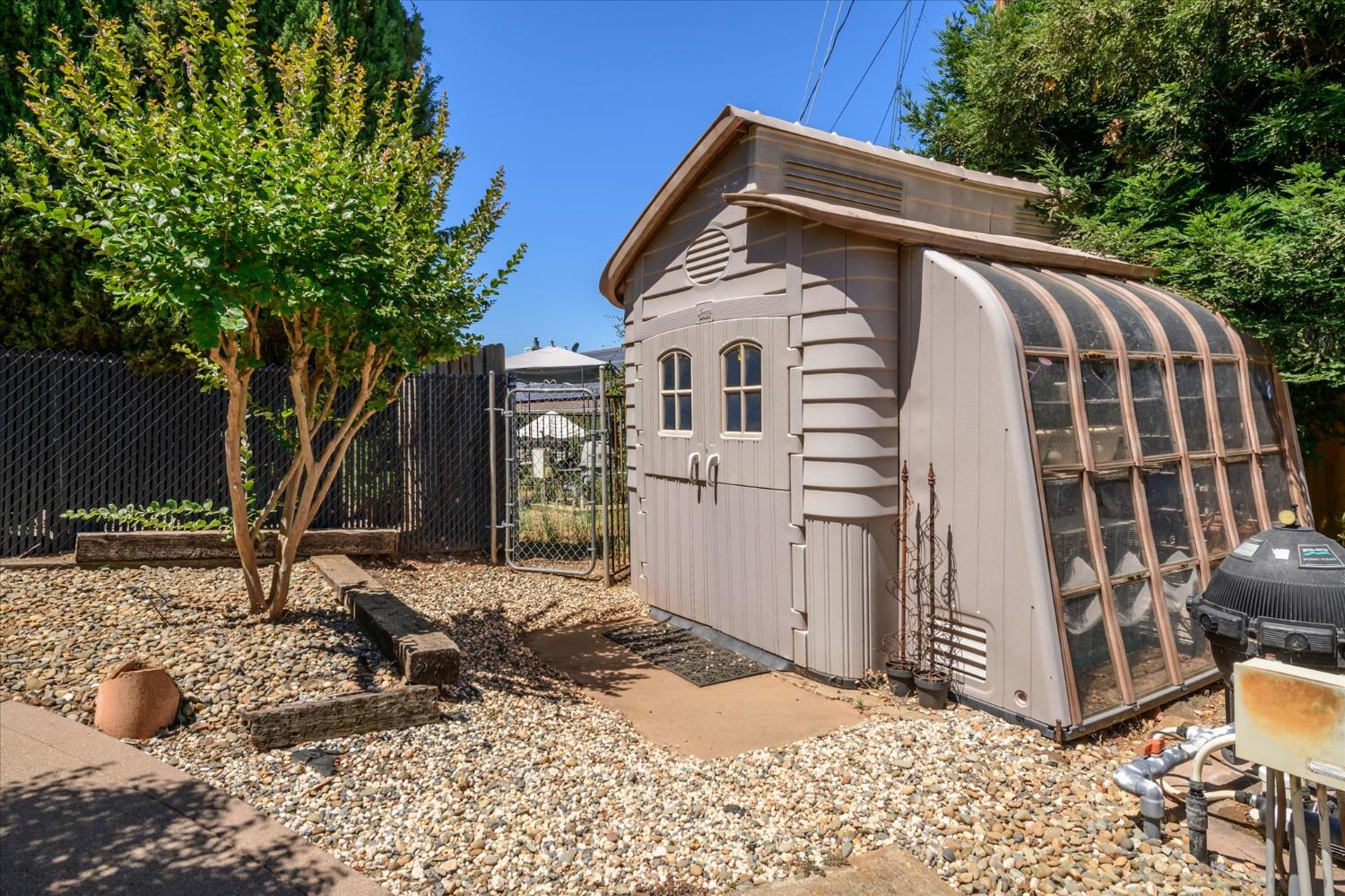 3165 Oakwood Road Cameron Park, CA 95682 - Photo 53 of 55 For those who enjoy gardening, the property includes a greenhouse and generous usable space for growing vegetables, plants, or flowers.