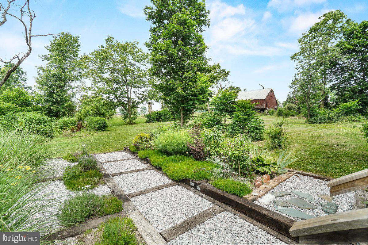 1498 Mckinstrys Mill Road Union Bridge, MD 21791 - Photo 43 of 54 a view of a garden with an outdoor space