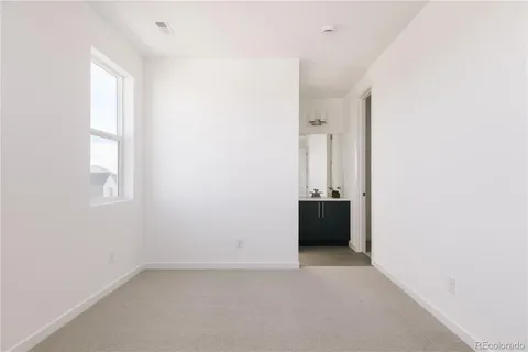 an empty room with window