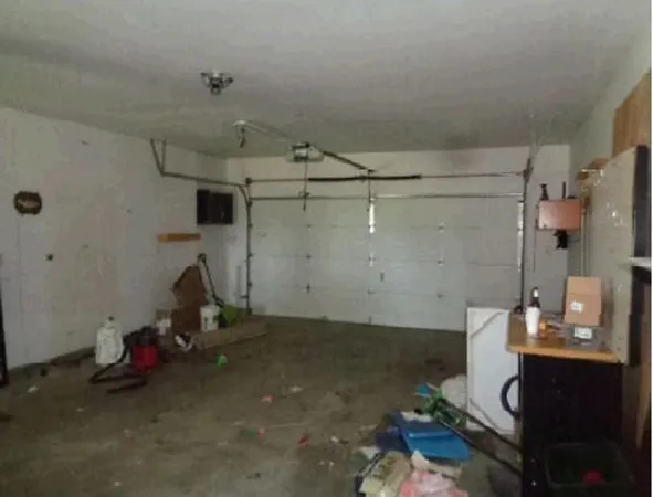a view of a storage & utility room with two washing machine