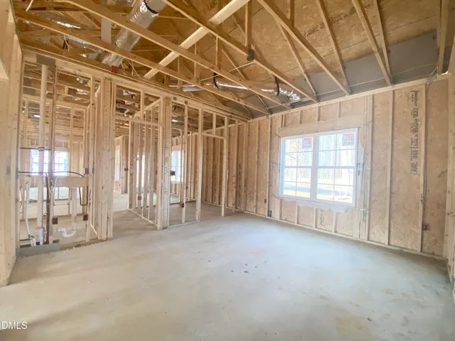 a view of an empty room with a sliding door