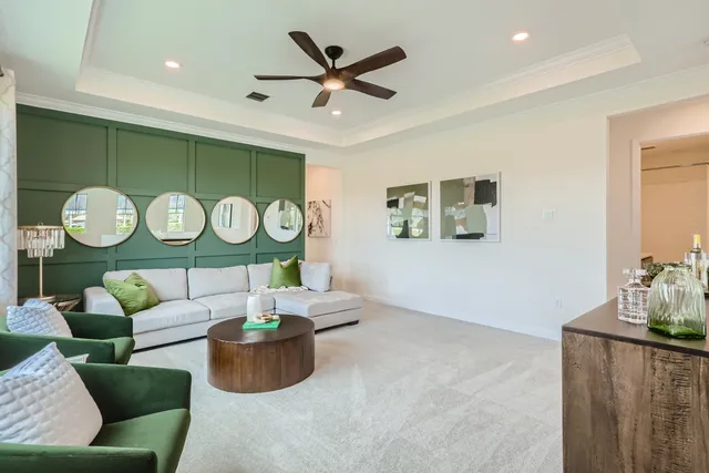a living room with furniture and a table