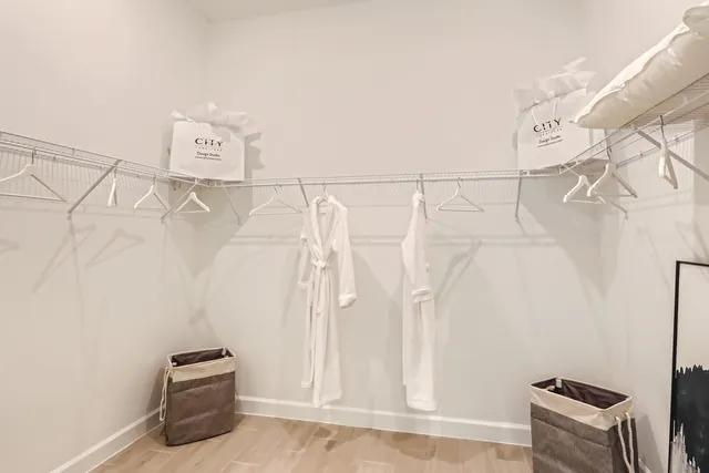 a bathroom with a shower curtain and a sink