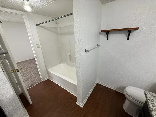 a bathroom with a sink and a shower