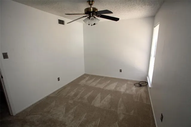 a view of a room with rack on the wall