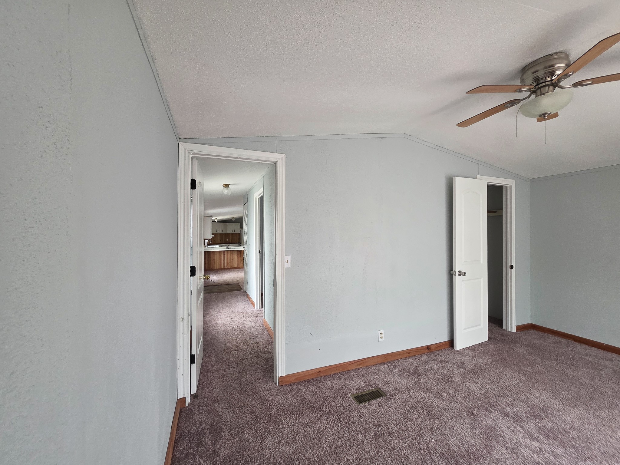 344 Holmes Road Onalaska, TX 77360 - Photo 6 of 25 331 Holmes, one of the three bedrooms.