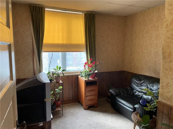 a room with furniture and a window